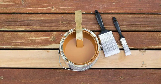 If you want to preserve the natural look of the pressure treated plywood, apply a coat of clear or light-colored glue on it