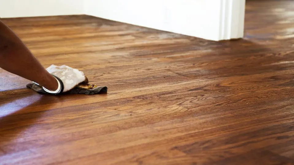 Do you have to sand hardwood floors before restaining?